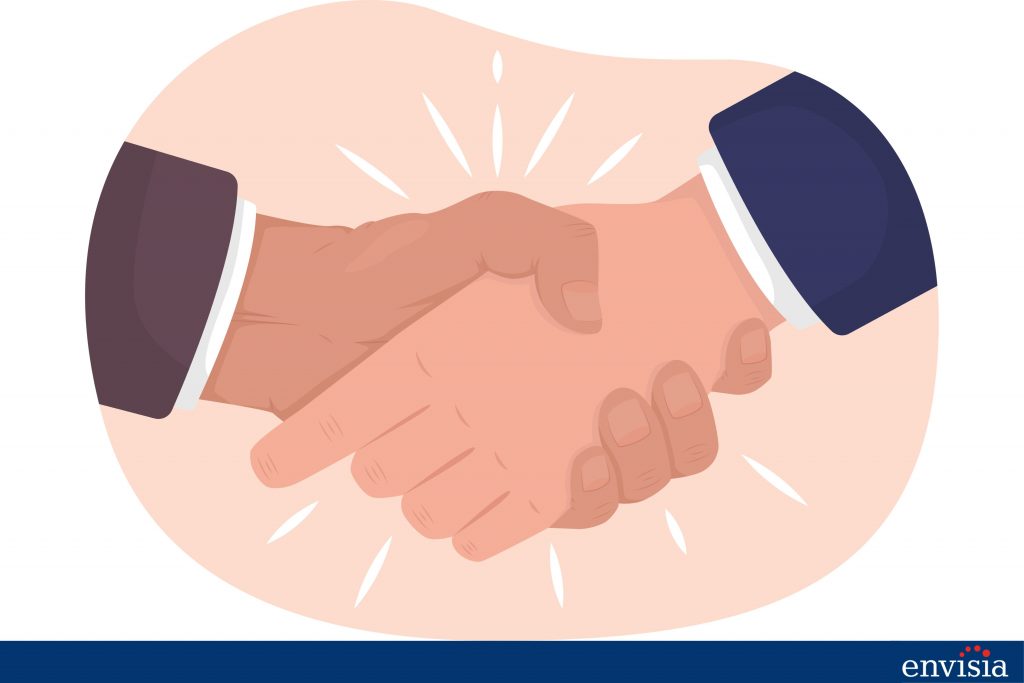 Handshake symbolizing trust-building as a solution to overcome the common criticism of lack of confidentiality in 360-degree feedback.