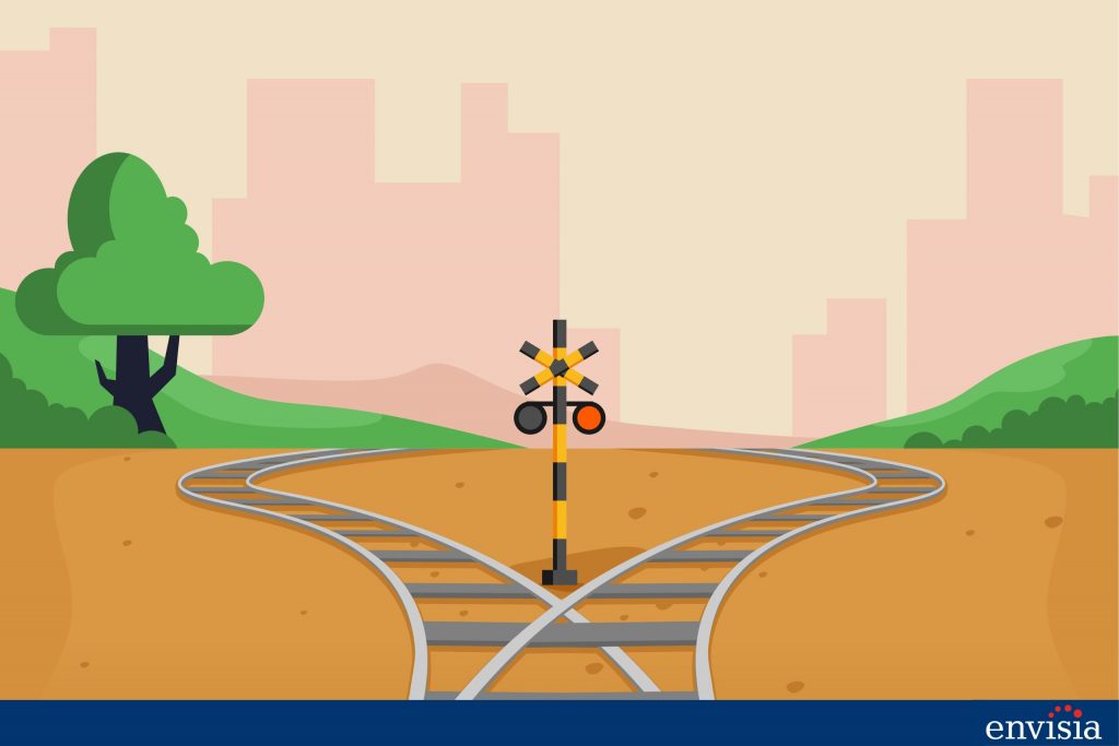 Illustration of diverging train tracks symbolizing why rater groups may not fully agree in 360-degree feedback assessments.